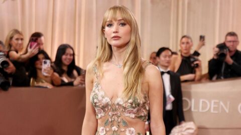 Jennifer Lawrence at the 2026 Golden Globe Awards in See Through Givenchy Dress 14