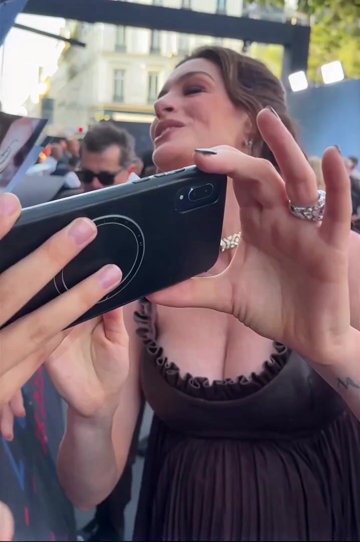 Hot Anne Hathaway Shows Cleavage at The Odyssey Paris Premiere photo gallery Hot Anne Hathaway Shows Cleavage at The Odyssey Paris Premiere photo gallery