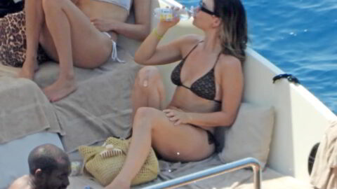 Lily James Flaunts Her Hot Figure in a Skimpy Dark Bikini While Yachting in Portofino 6