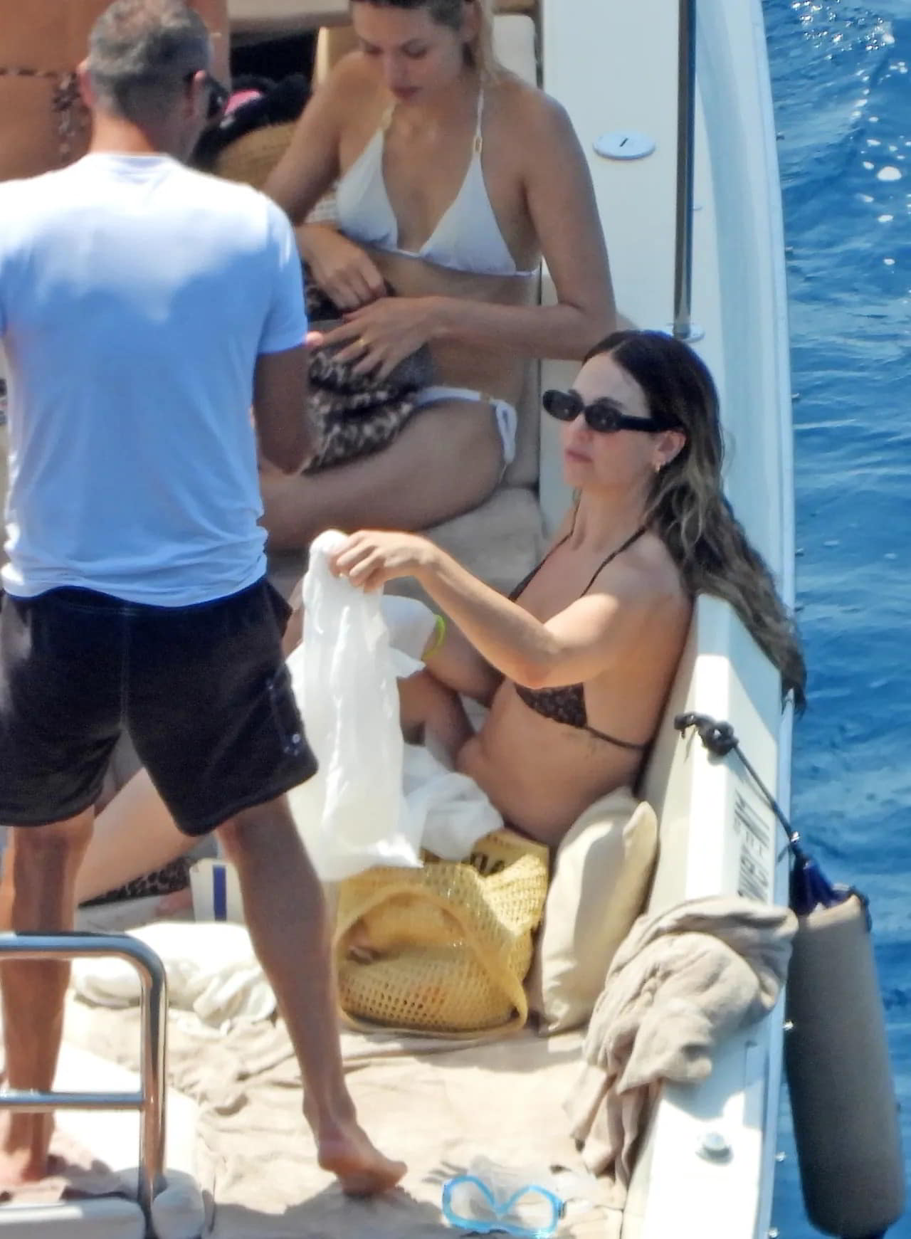 Lily James Flaunts Her Figure in a Skimpy Dark Bikini While Yachting in Portofino topless picture Lily James Flaunts Her Figure in a Skimpy Dark Bikini While Yachting in Portofino topless picture